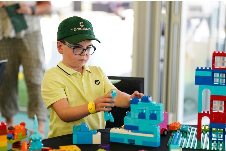 A child playing with building blocks.