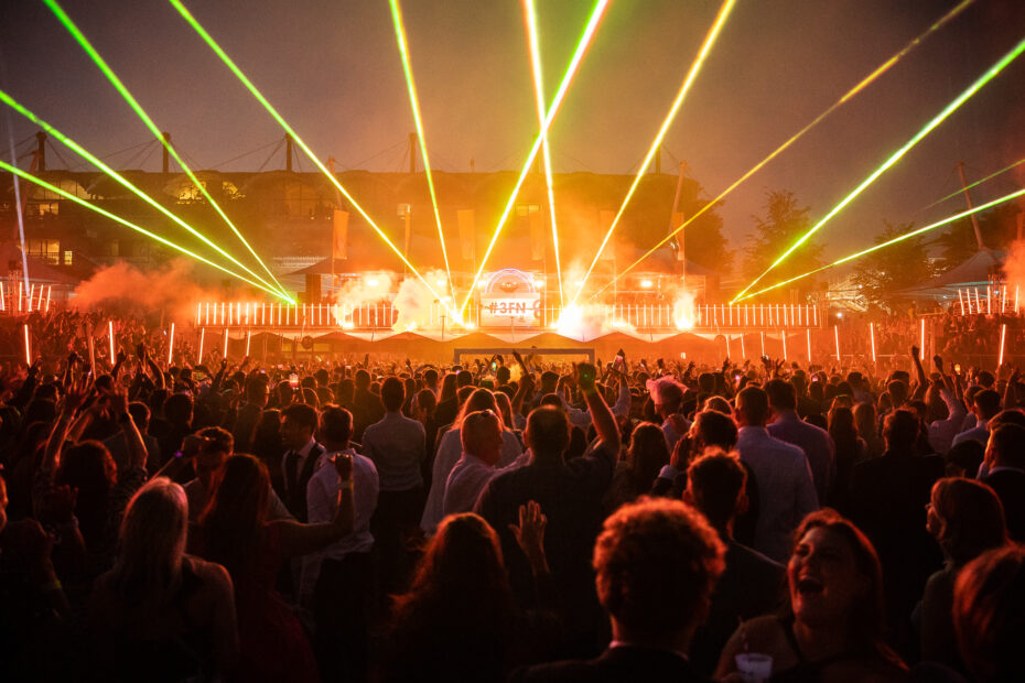 A crowd enjoying a DJ set at Goodwood Racecourse