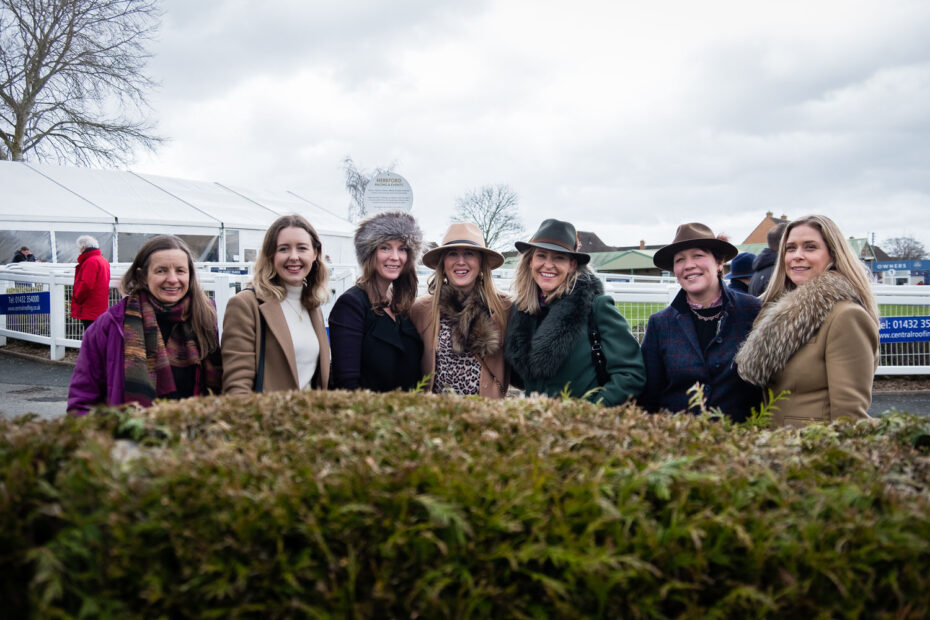 A group of racegoers at an Arena Racing Company Racecourse