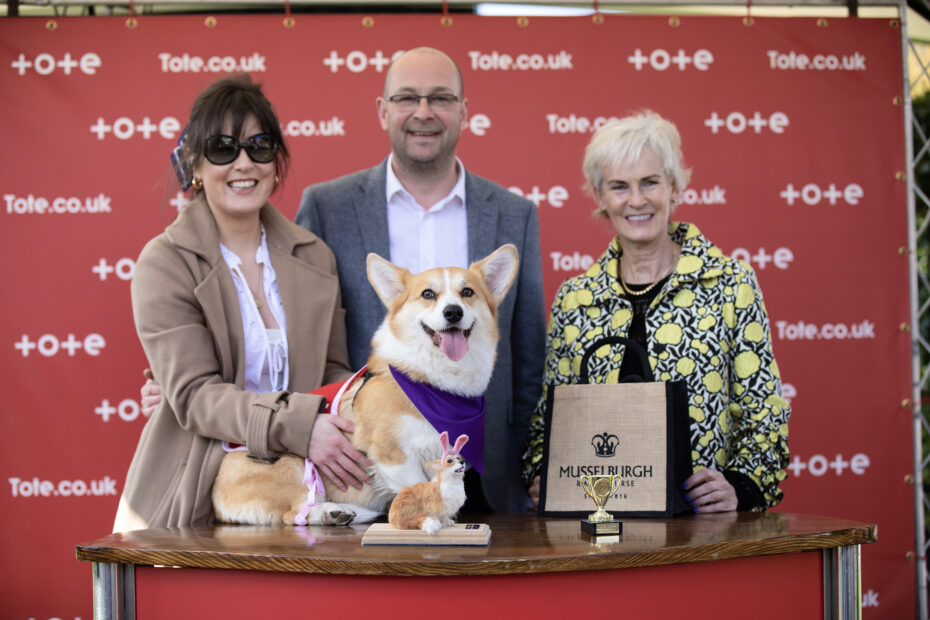 A group of people presenting a prize at Musselburgh Racecourse