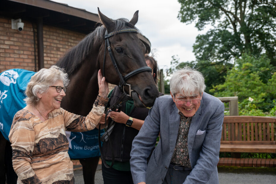 York Racecourse equine ambassador meeting two people.