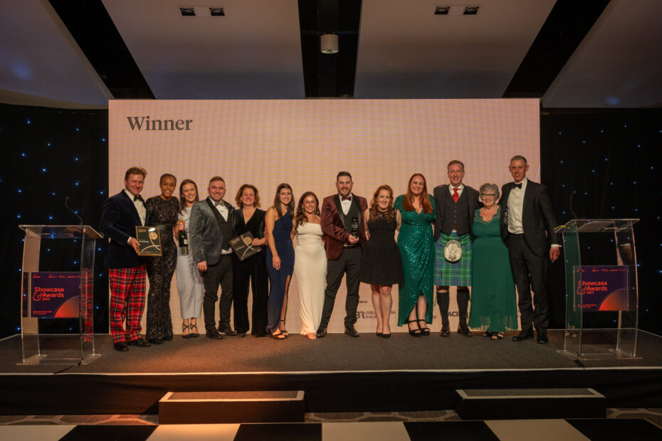 A picture of the Musselburgh Racecourse team collecting the 2023 RCA Showcase Champion award at the RCA Showcase Awards