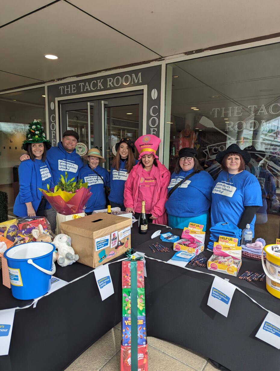 Volunteers from YBTC manning a stand at the Wear a Hat Raceday at Wetherby Racecourse